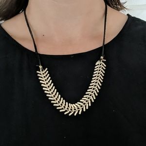 Leather and gold necklace